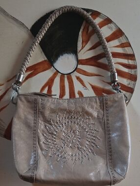 The Sak Tan Indio Leather Handbag With Whipstitch Accent And Braided Strap